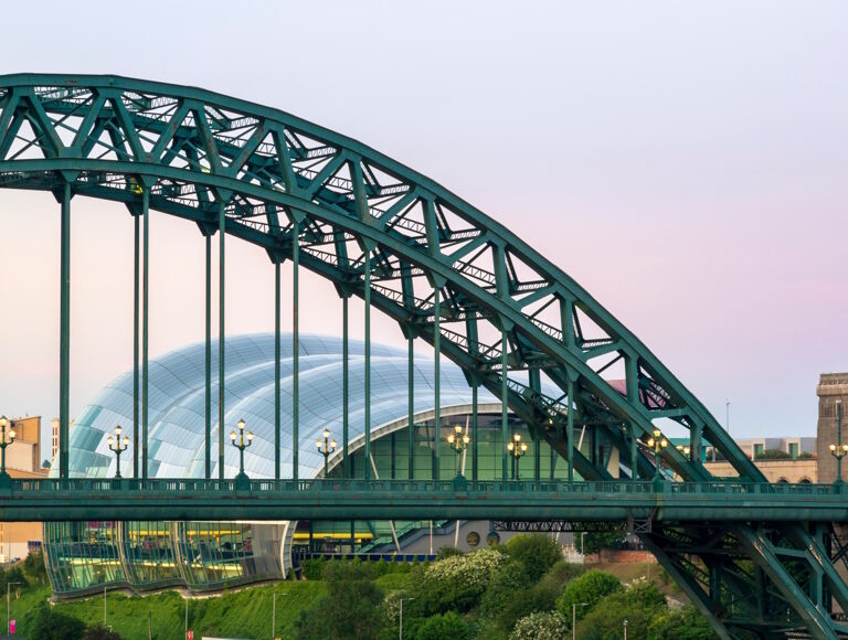 Photograph of the Tyne Bridge with The Glasshouse in the background